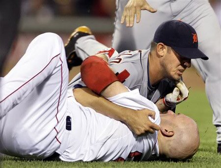Kevin Youkilis gets tackled